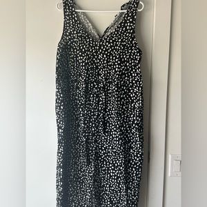 This beautiful polka dot petite jumpsuit, size is US 10. Perfect fit